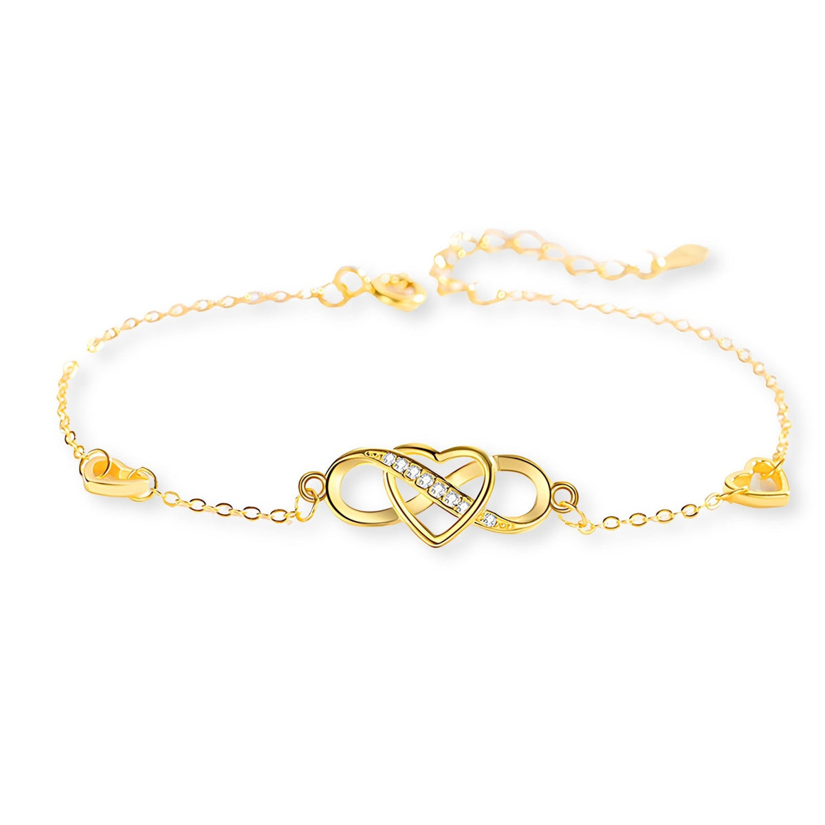 Bracelet en or avec charm infini et cœur pavé de zircones, chaîne fine délicate.