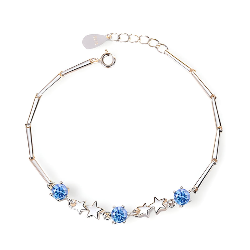 Bracelet en argent sterling avec charms étoiles et perles bleues, modèle Tracy.