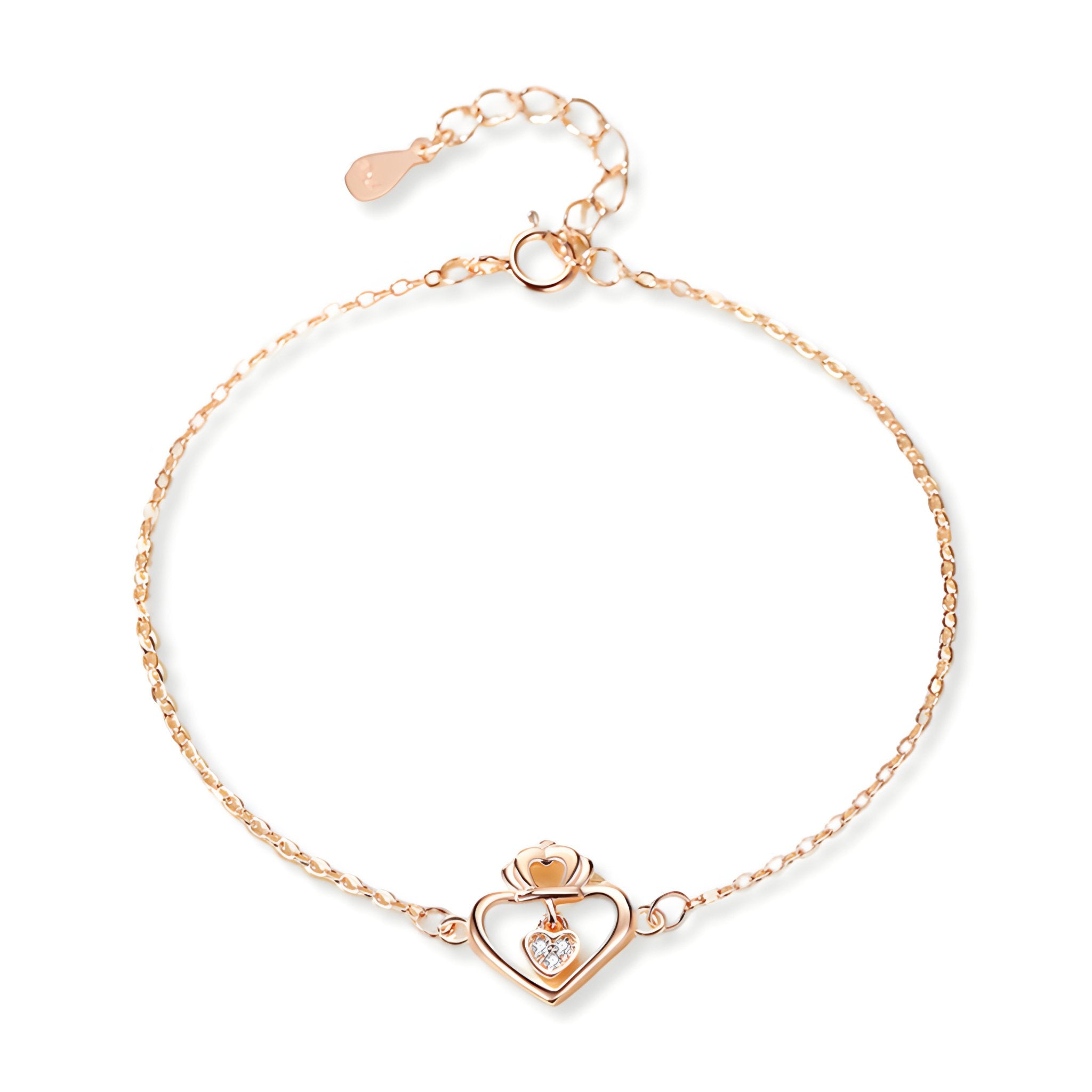 Bracelet fin en argent or rosé avec cœur central creux et chaîne délicate ajustable.