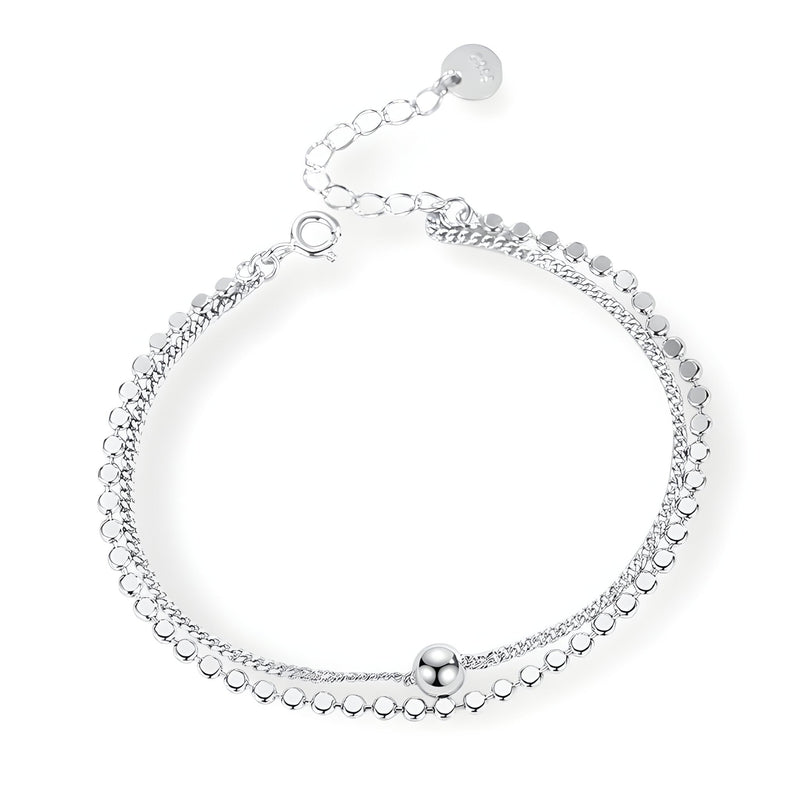 Bracelet double maille en argent sterling avec petite perle et chaîne ajustable.