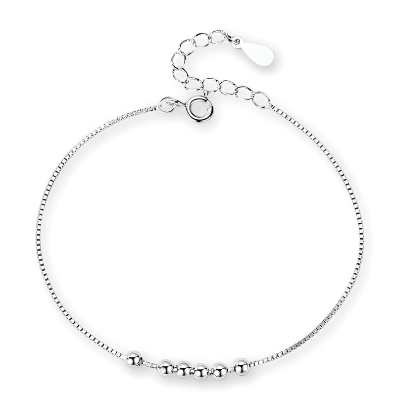 Bracelet fin en argent sterling avec petites perles rondes et chaîne ajustable.