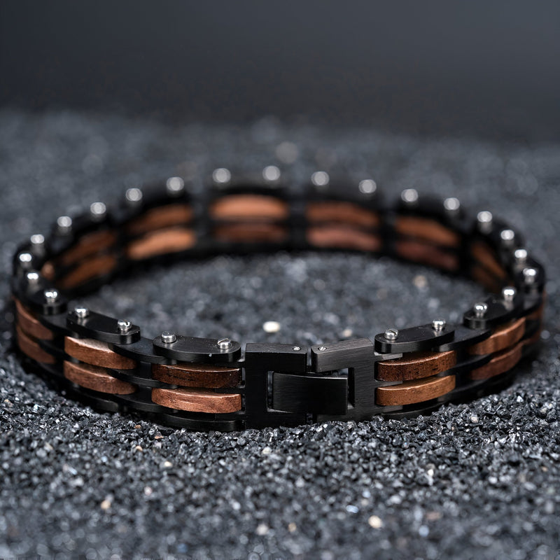 Bracelet homme en bois de noyer noir et marron avec maillons métalliques noirs, style robuste et élégant.