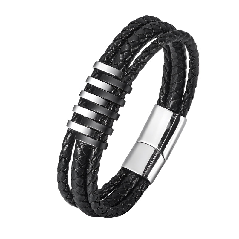 Bracelet en cuir noir tressé à double tour avec motifs métalliques argentés et fermoir magnétique barrette.