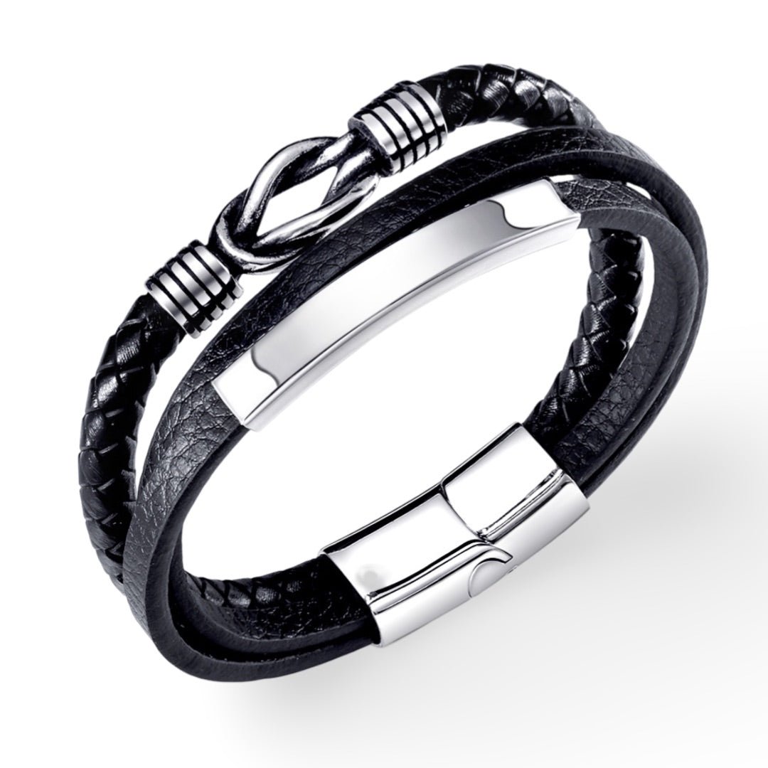Bracelet homme noir multi-rangs en cuir tressé avec fermoir métallique argenté brillant.