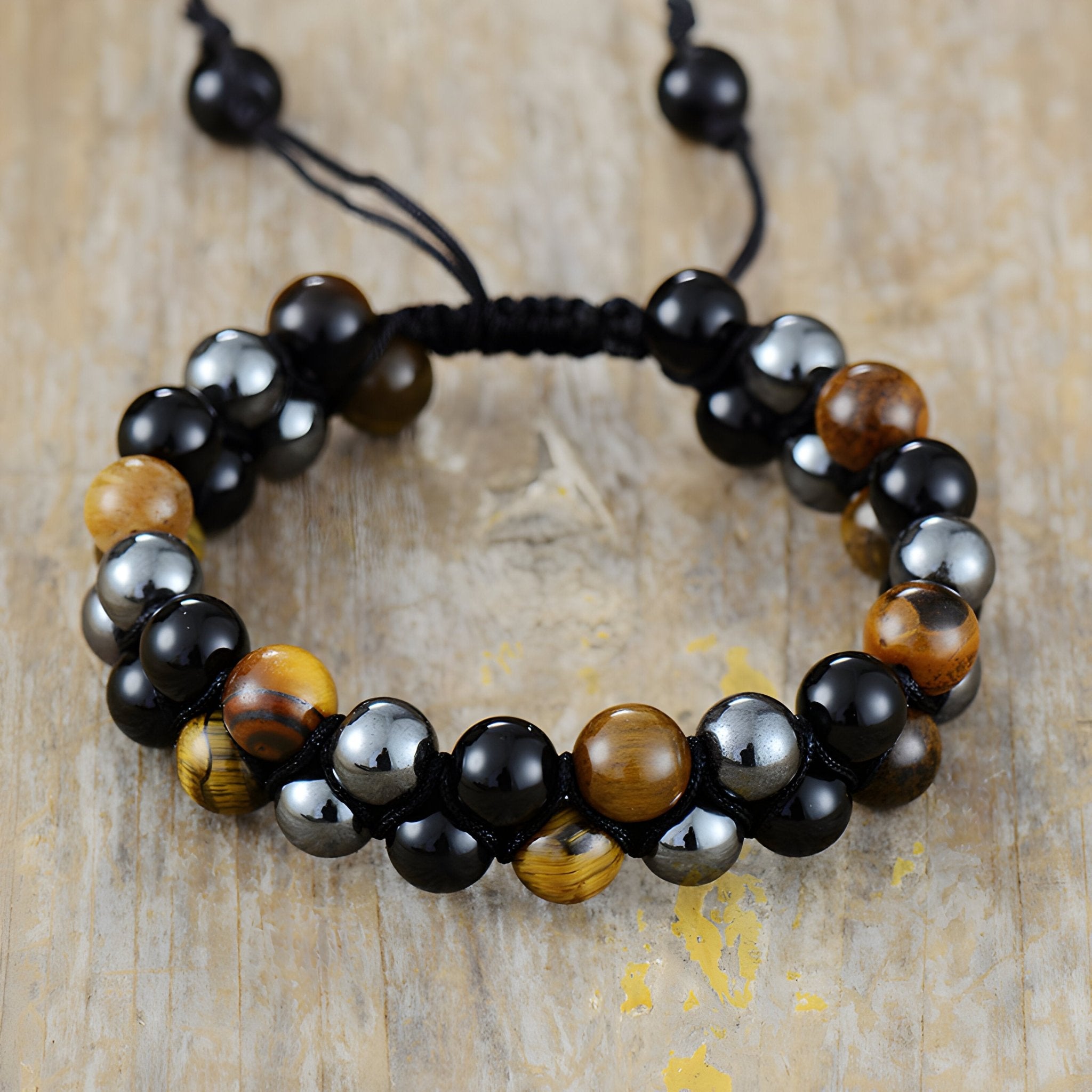 Bracelet homme perles oeil de tigre, hématite noire et shaligram, design tressé réglable.