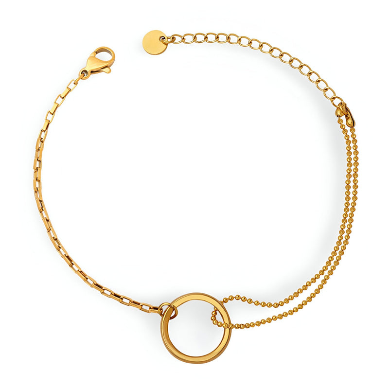 Bracelet fin en titane plaqué or 18 carats avec double chaîne et anneau circulaire central.