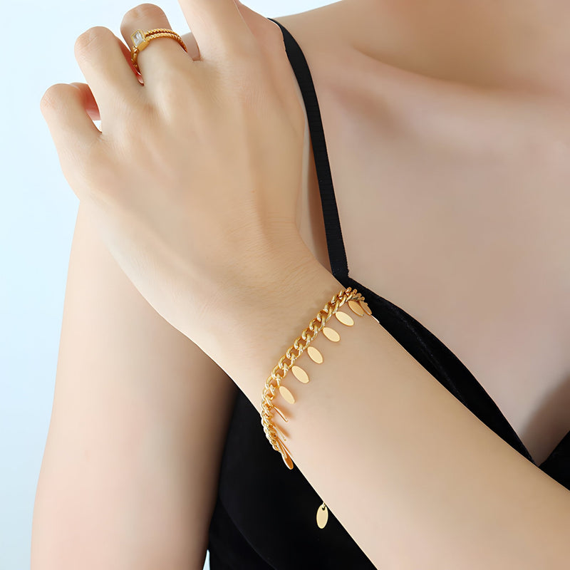 Pulsera de titanio chapada en oro de 18 quilates, con pequeños medallones, modelo Charlène