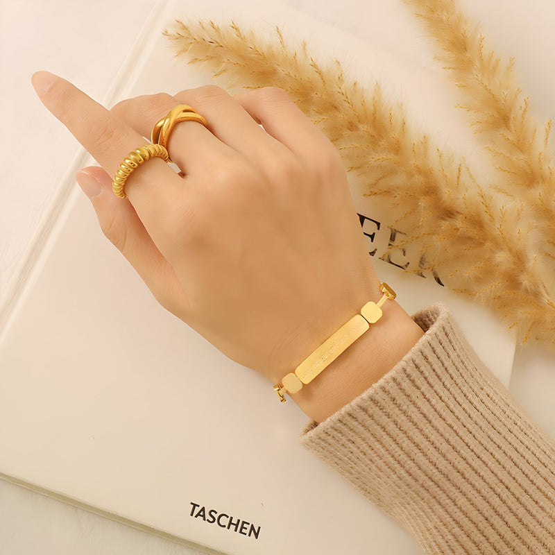 Pulsera de titanio chapada en oro de 18 quilates,