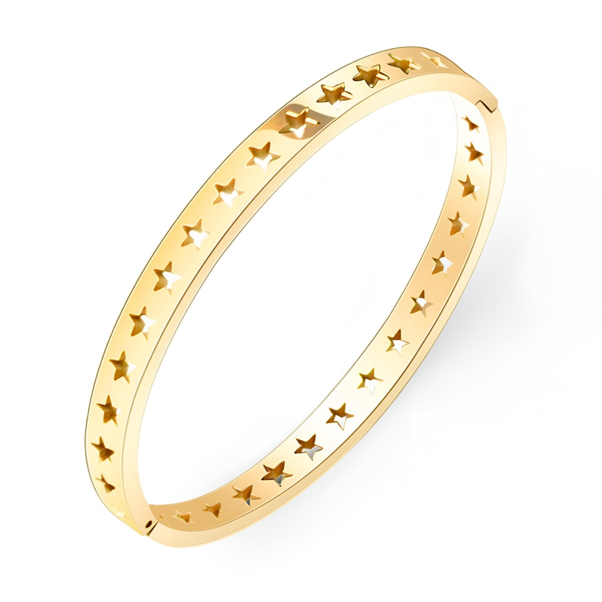 Bracelet rigide en titane plaqué or 18 carats avec motif d'étoiles creuses ajourées.