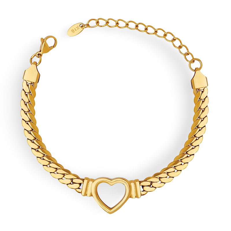 Bracelet en maille fine plaqué or avec cœur creux au centre et fermoir mousqueton.