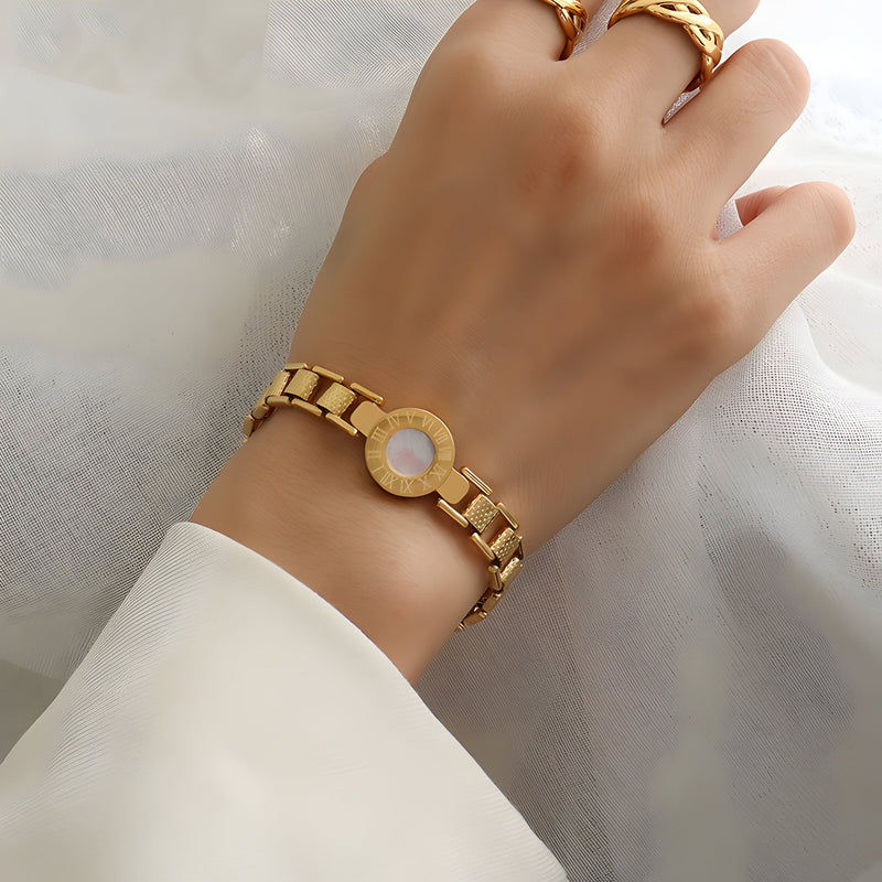 Pulsera de titanio chapado en oro, imitación de esfera con números romanos, modelo Jane