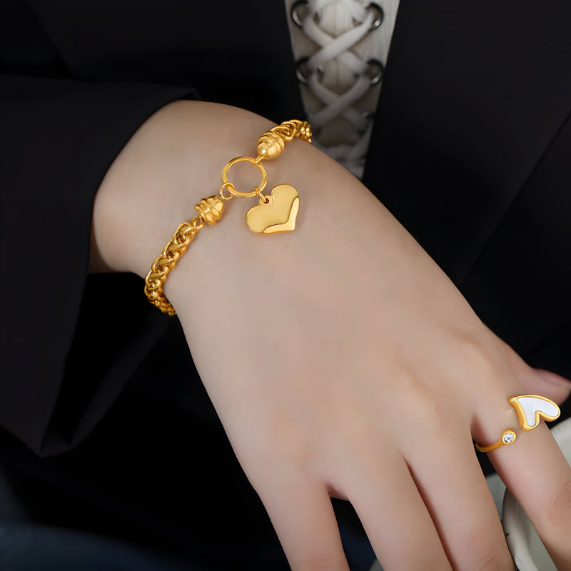 Pulsera de titanio chapado en oro, cadena trenzada, diseño de corazón, modelo Estelle