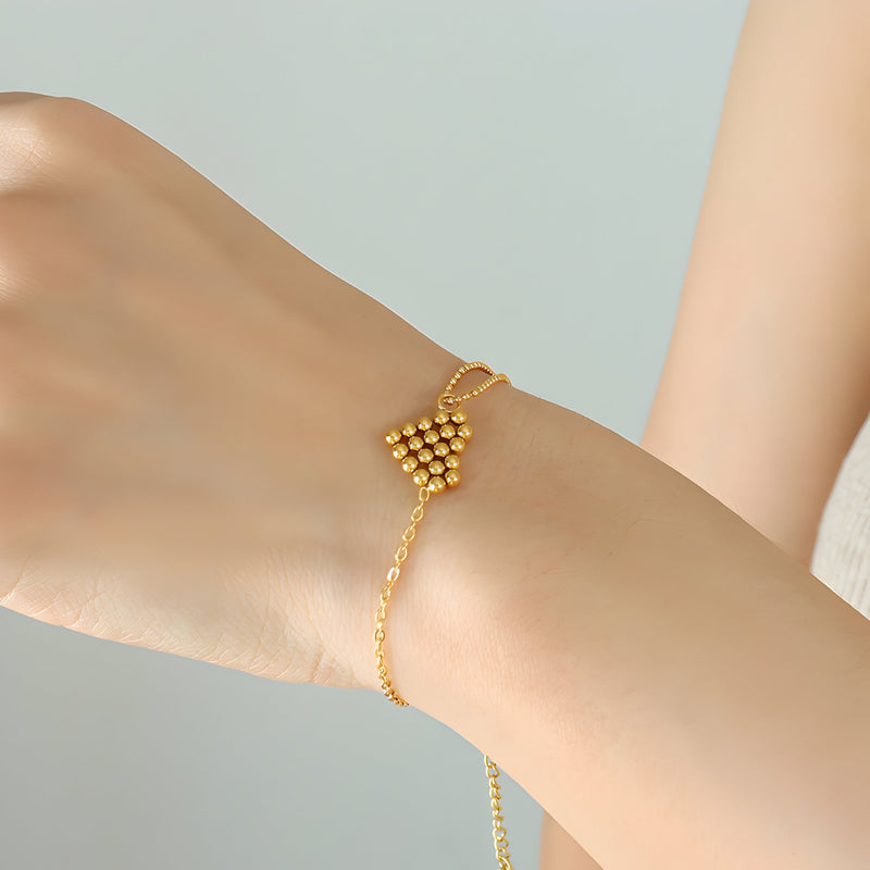 Pulsera de titanio chapado en oro, diseño de corazón con perlas, modelo Lola