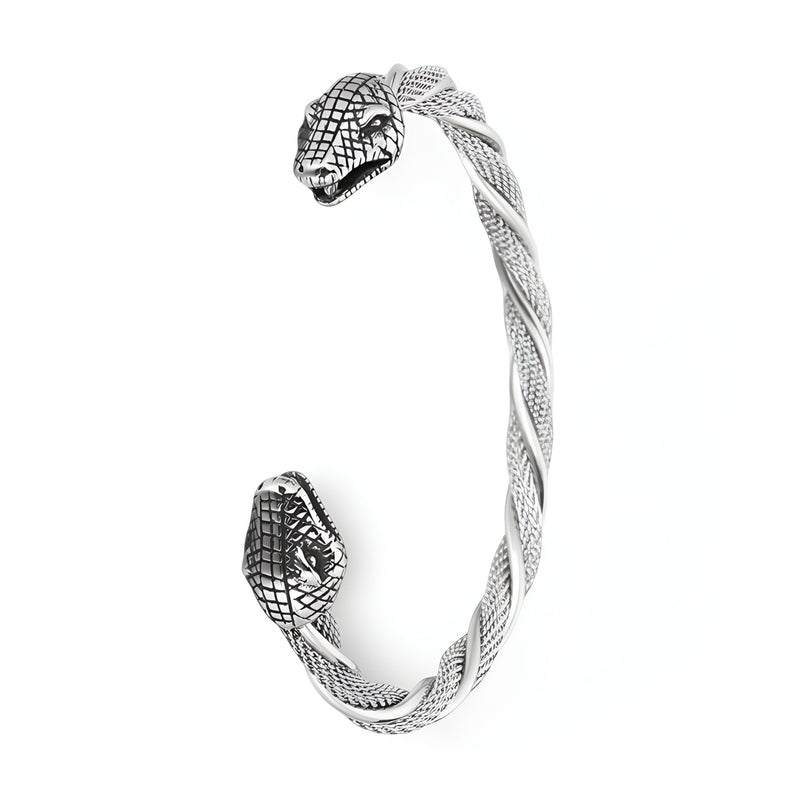 Bracelet jonc argent en acier inoxydable torsadé à double têtes de serpent texturées.