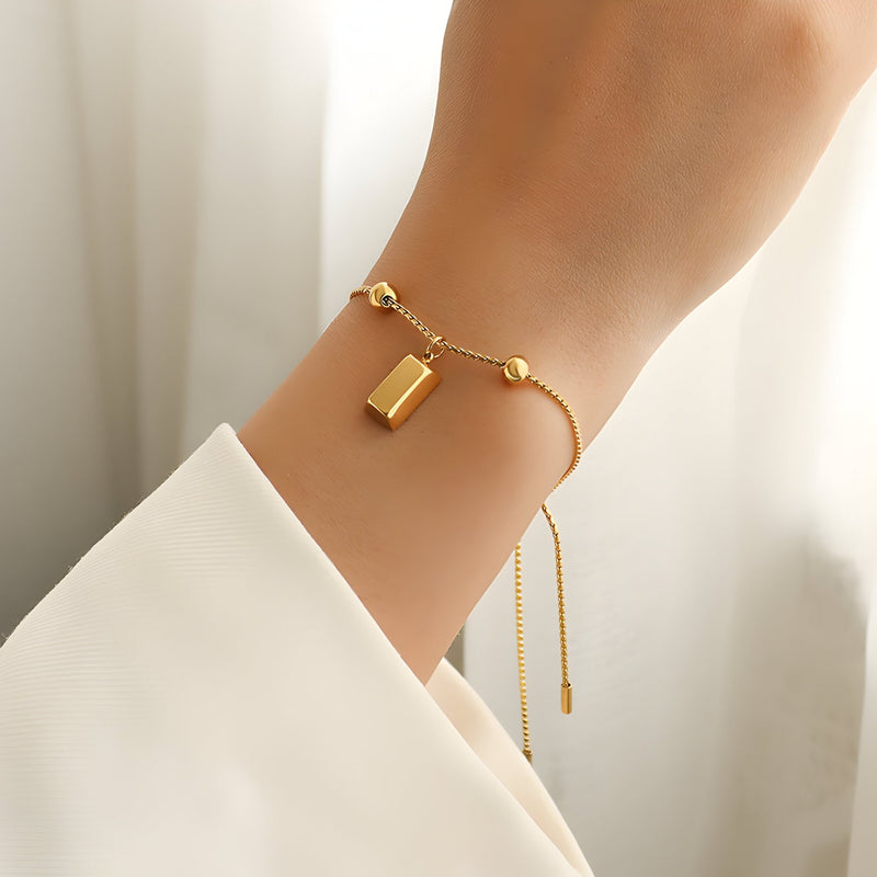 Brazalete rígido de titanio chapado en oro de 18 quilates, diseño ladrillo, modelo Dorie