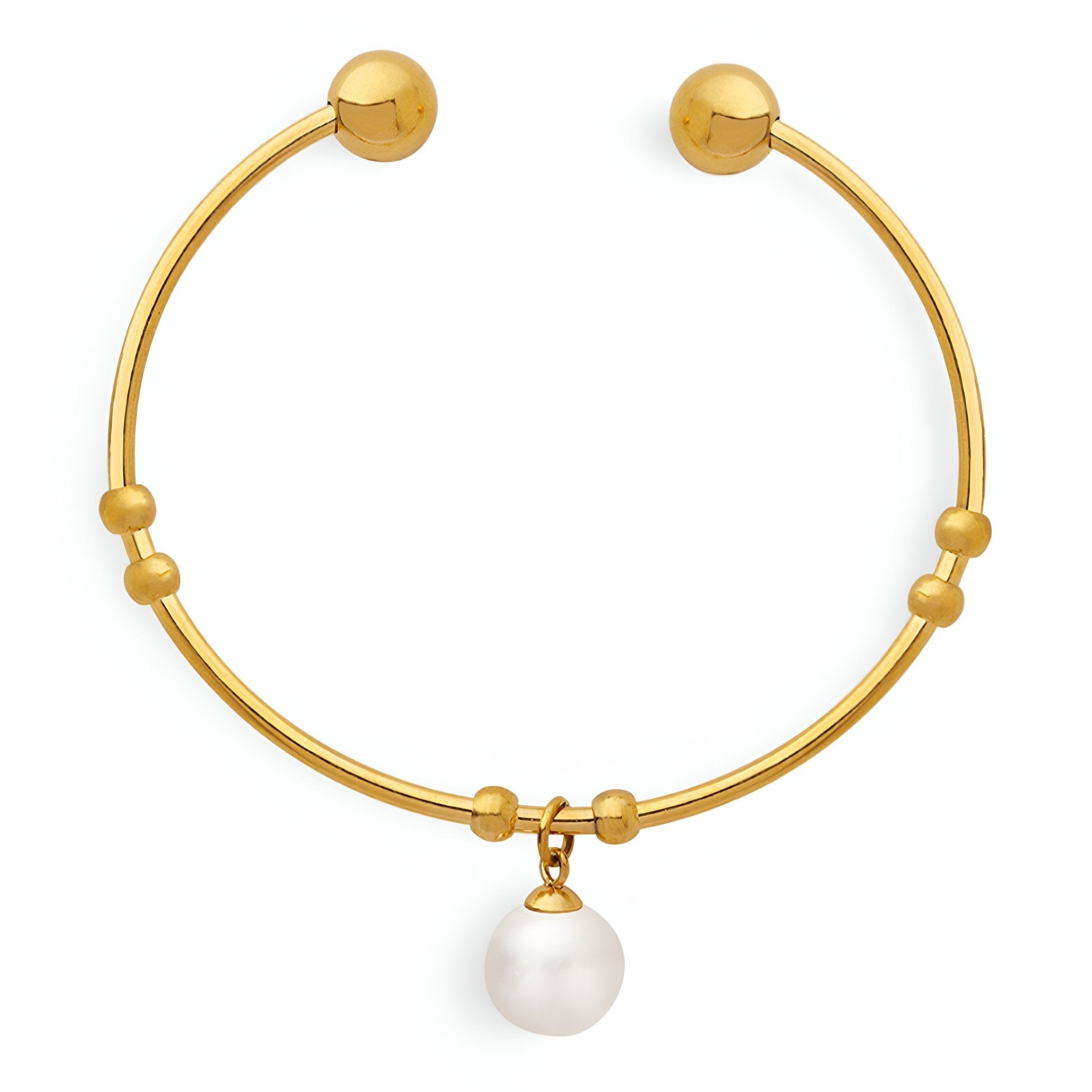 Bracelet jonc en titane plaqué or avec perle blanche ronde suspendue et détails boules dorées.