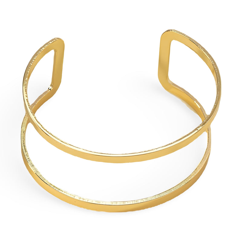 Bracelet manchette double rang en métal doré lisse et brillant, design minimaliste.