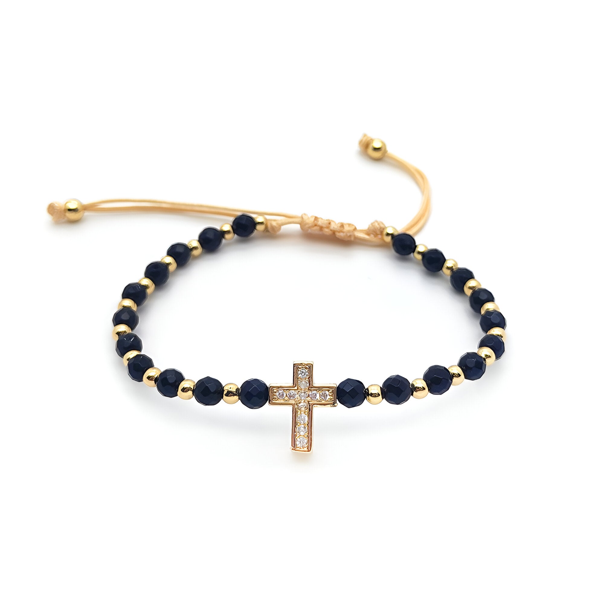 Bracelet noir à perles avec croix en strass et cordon doré ajustable.