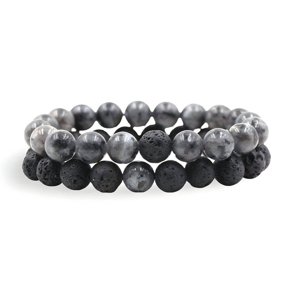 Duo de bracelets en pierres naturelles grises et noires, perles lisses et volcaniques, style mixte.
