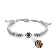 Bracelet corde gris avec plaque titane ronde personnalisée photo au centre.