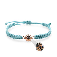 Bracelet corde turquoise avec médaille centrale en titane or rosé et photo personnalisée.
