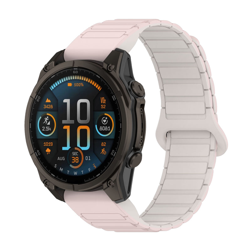 Bracelet pour montre Garmin en silicone rose clair avec attache aimantée et maillons flexibles.