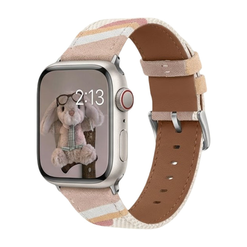 Bracelet Apple Watch Claire en toile tissée rose et beige, intérieur en cuir camel, boucle argentée.