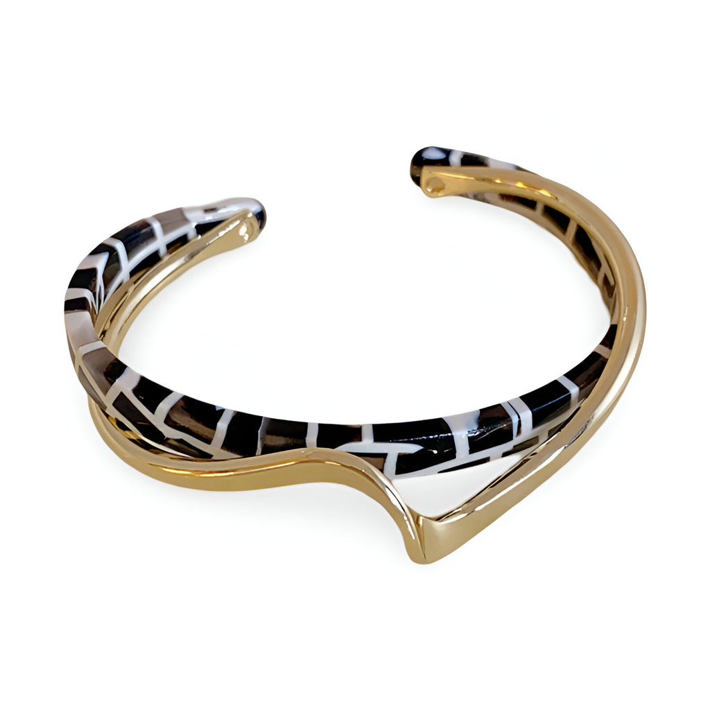 Bracelet jonc femme en métal doré avec motif léopard noir et blanc en acrylique, style Valencia.