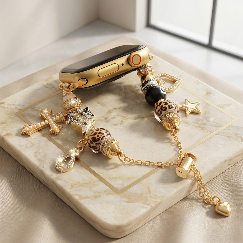 Bracelet Apple Watch à charms dorés, croix ornée de perles, étoiles scintillantes, billes léopard, boule de billard, fermoir coulissant réglable, modèle Junia