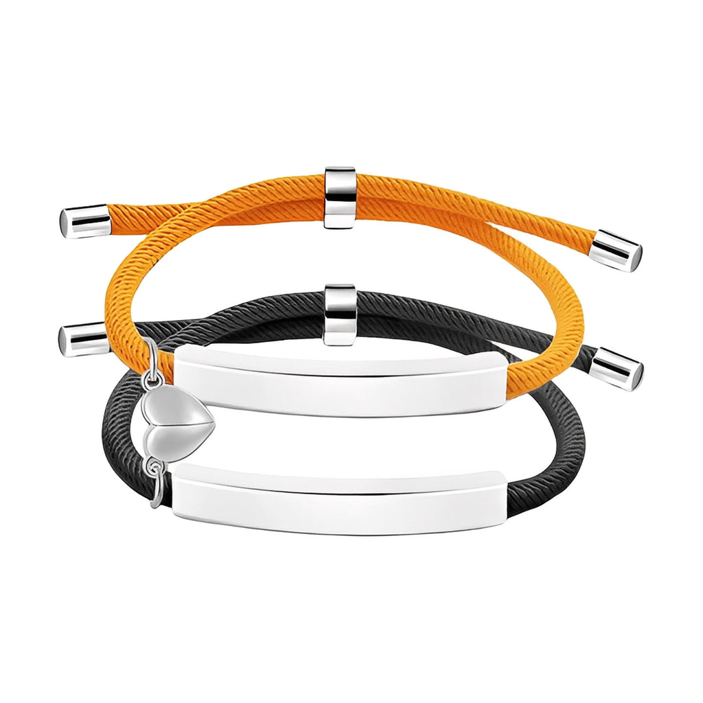 Bracelets couple en corde orange et noire, acier inoxydable avec plaques gravables et cœur aimanté argenté.