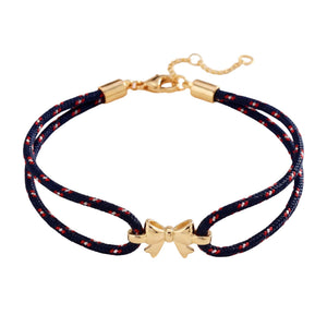 Gevlochten nylon armband met vergulde knoopbedel, verfijnd en verstelbaar damesaccessoire, ideaal voor een chique en spontane look, model Rubane
