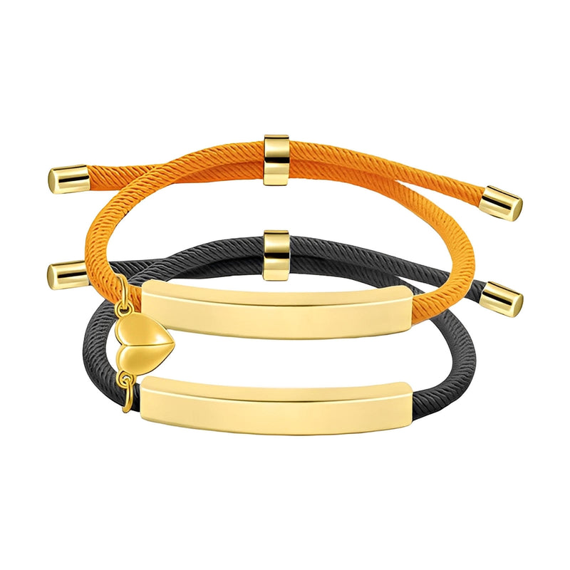 Bracelet couple corde orange et noir avec barres et cœur aimanté en acier inoxydable doré.