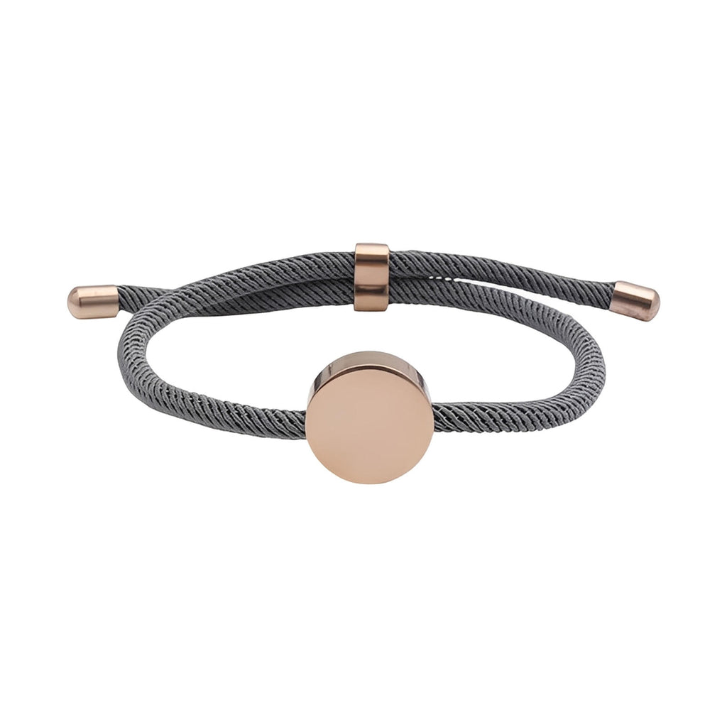 Bracelet cordon gris avec médaillon rond en acier inoxydable doré, modèle Dax.