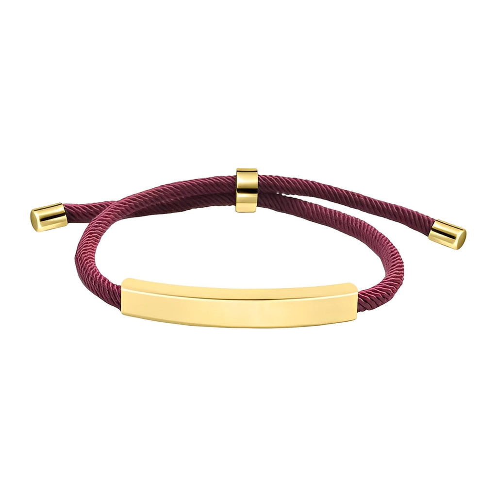 Bracelet cordon nylon bordeaux avec barre et embouts en acier inox doré, fermoir coulissant ajustable.