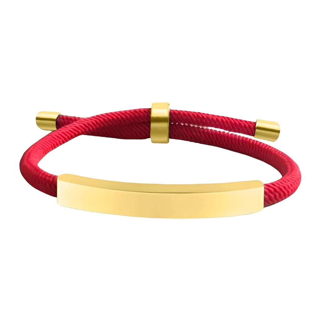 Bracelet cordon nylon rouge avec barre et embouts en acier inoxydable doré, fermoir coulissant.
