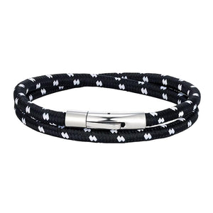 Bracelet cordon noir tressé à motifs blancs, boucle magnétique en acier inoxydable brillant, style nautique double brin.
