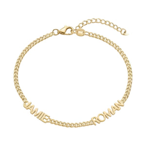 Bracelet fin en acier inoxydable doré avec chaînes maille cubaine et prénoms découpés Danié et Roman.