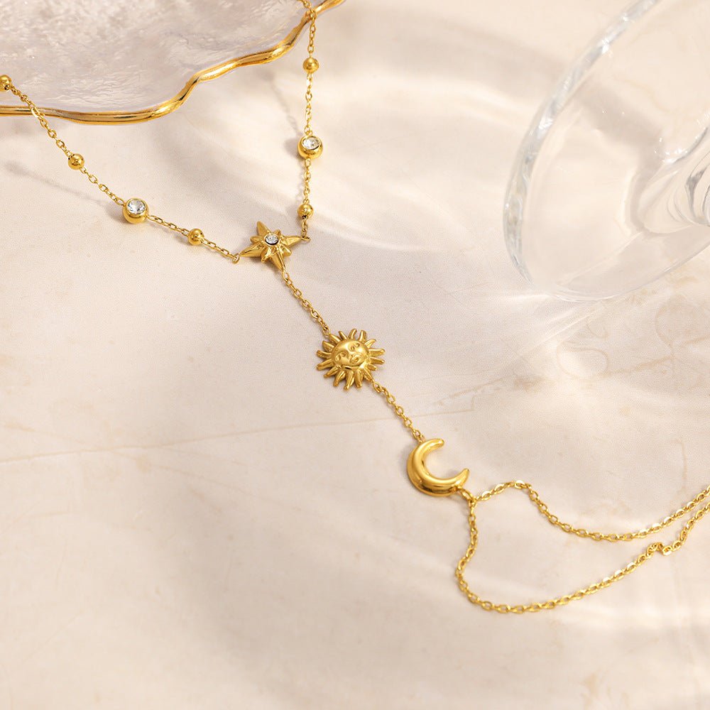 Bijou de main femme acier inoxydable, bracelet bague chaîne dorée, motif soleil lune étoile, accessoire élégant ajustable, modèle Sonnie