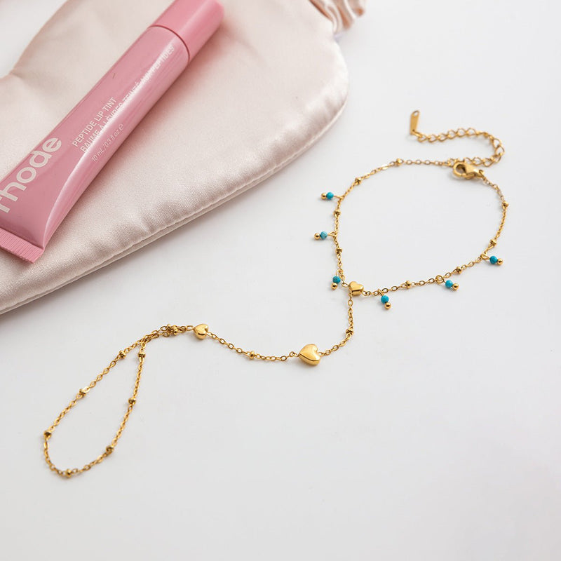 Bijou de main en acier inoxydable doré, perles turquoise et chaînette fine avec pendentif cœur, style Cigara.