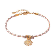 Bracelet en coton rose et gris avec fleur centrale en acier inoxydable doré.