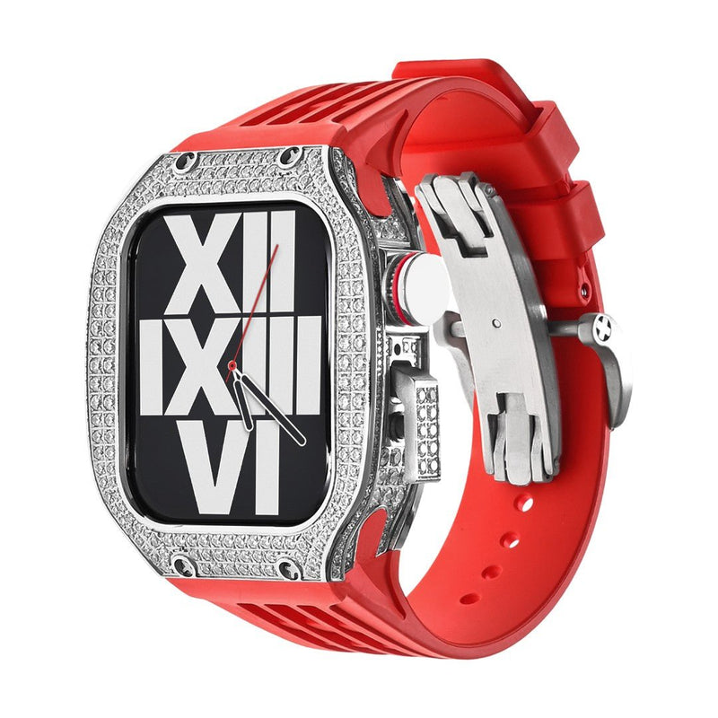 Boîtier Apple Watch en titane argenté orné de strass, bracelet silicone rouge vif, design moderne et robuste.