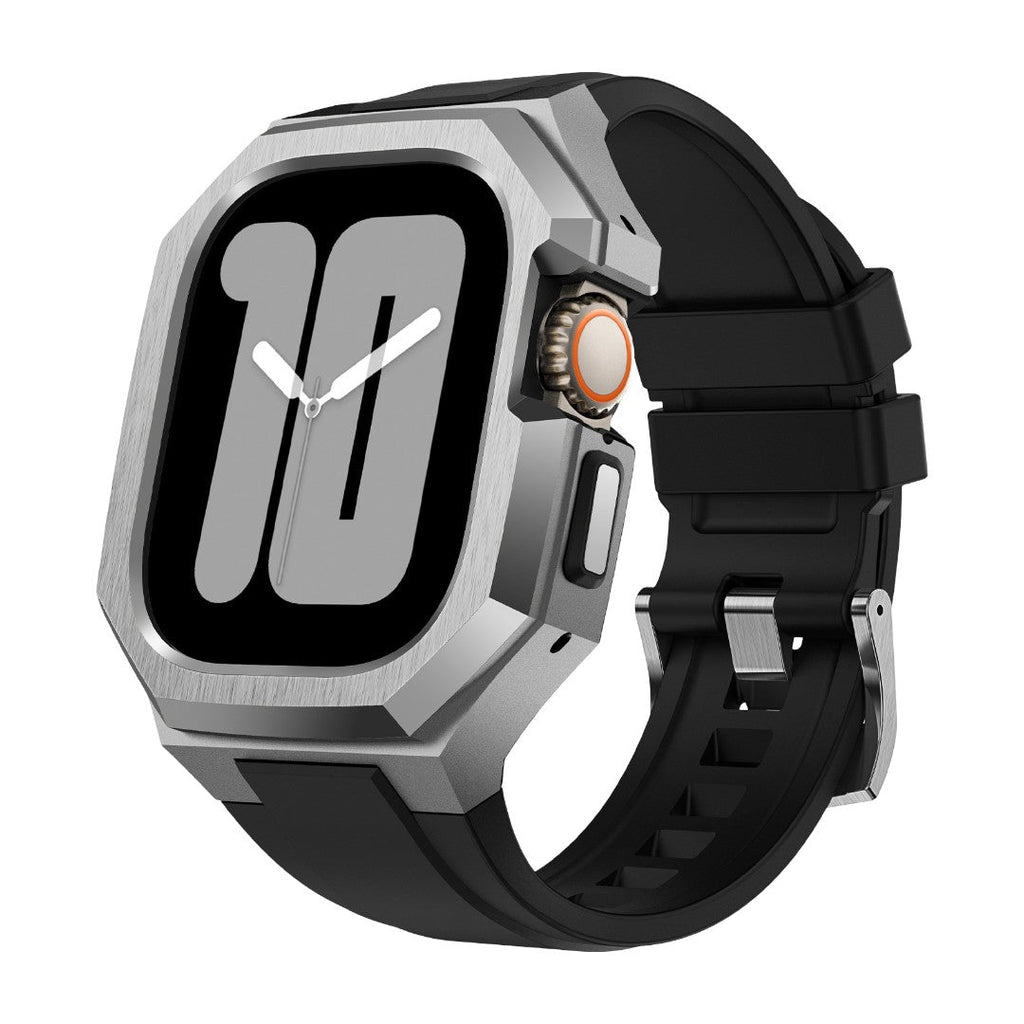 Boîtier Apple Watch en acier inoxydable angulaire gris avec bracelet sport noir en fluororubber robuste.