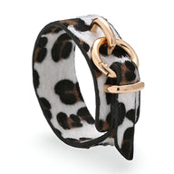 Bracelet femme en cuir imprimé léopard avec boucle dorée style Fauve.
