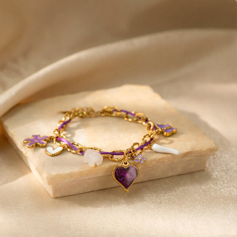 Bracelet à charms ajustable, chaîne dorée et cordon nylon violet, cœur pailleté, fleurs et papillons émaillés, modèle Neyma