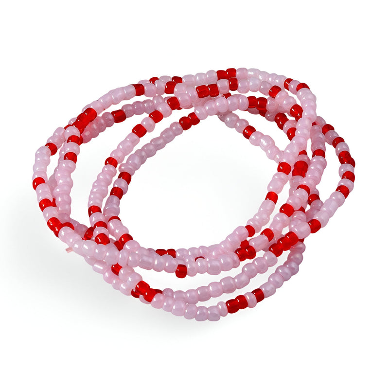 Bracelet à enrouler femme en perles de résine rose clair et rouge alternées, design élastique Narwa.