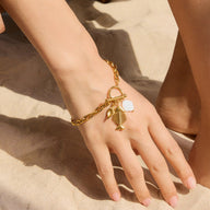 Bracelet à maille, pendentif poisson et coquillage, doré, en acier inoxydable, pour femme, modèle Lunith - La Boutique du Bracelet