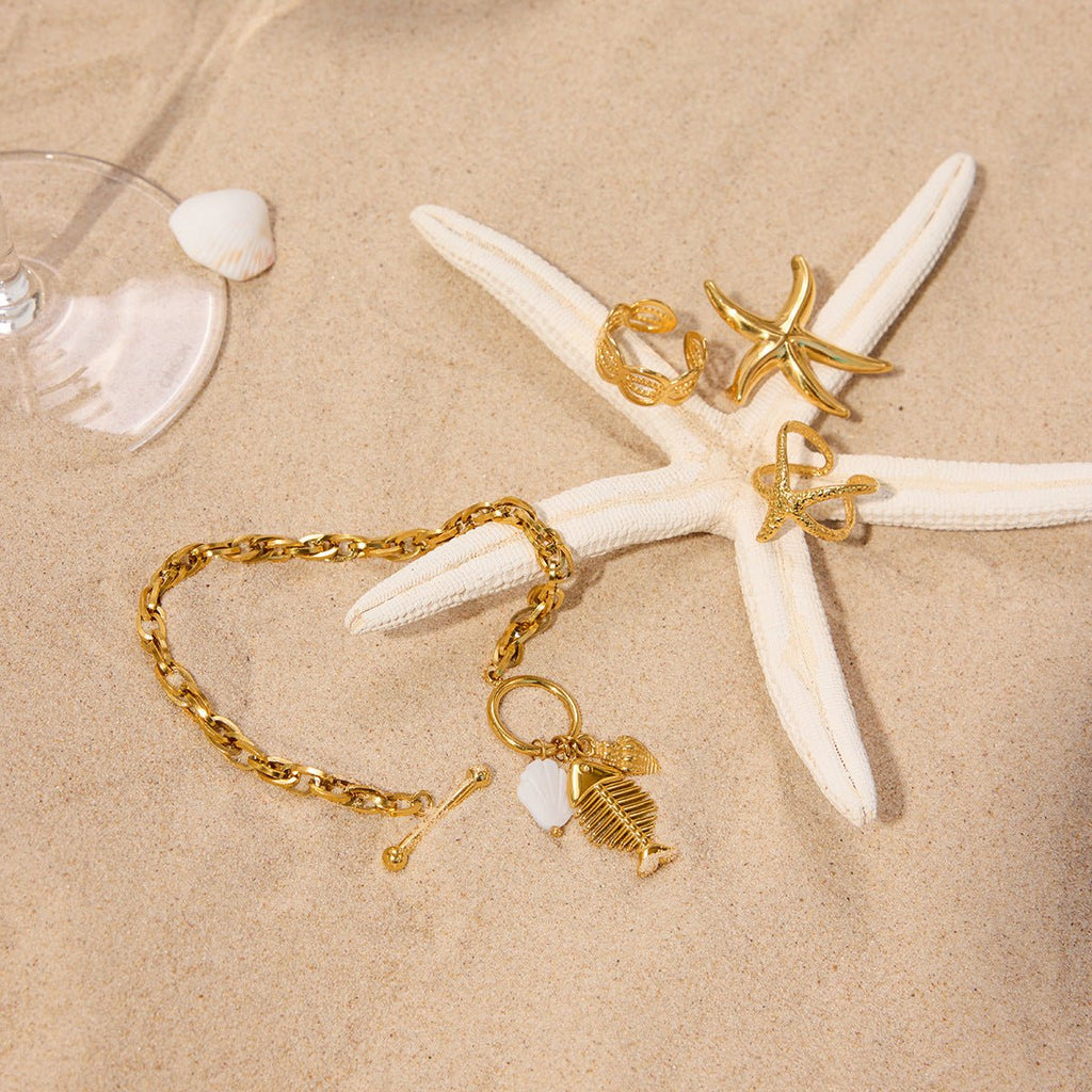 Bracelet à maille, pendentif poisson et coquillage, doré, en acier inoxydable, pour femme, modèle Lunith - La Boutique du Bracelet