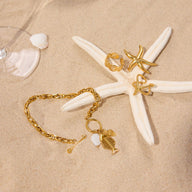 Bracelet à maille, pendentif poisson et coquillage, doré, en acier inoxydable, pour femme, modèle Lunith - La Boutique du Bracelet