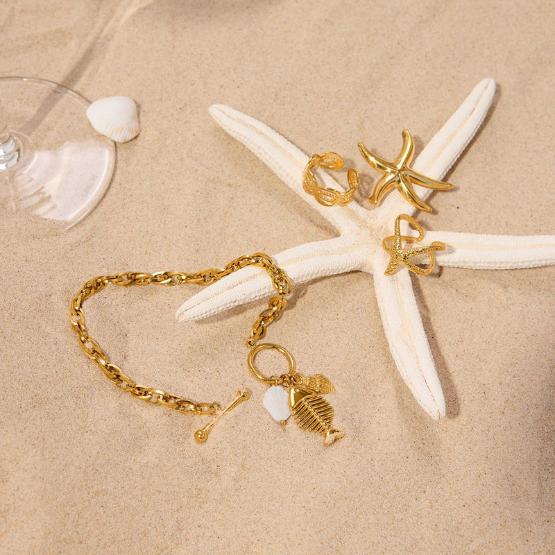 Bracelet à maille, pendentif poisson et coquillage, doré, en acier inoxydable, pour femme, modèle Lunith - La Boutique du Bracelet