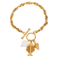 Bracelet à maille, pendentif poisson et coquillage, doré, en acier inoxydable, pour femme, modèle Lunith - La Boutique du Bracelet